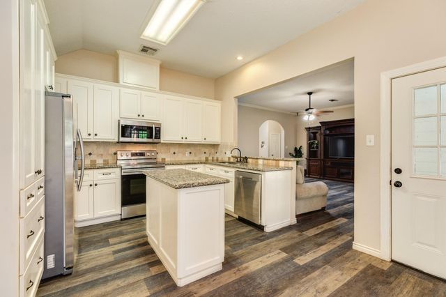 207 Audubon Woods Court, Richwood, TX 77531