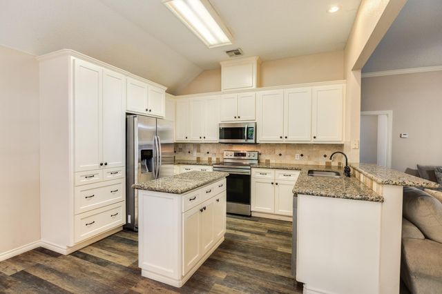 207 Audubon Woods Court, Richwood, TX 77531