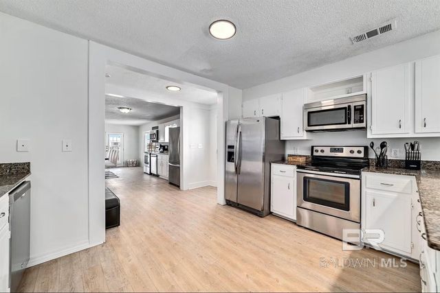 1360 WEST BEACH Boulevard, Gulf Shores, AL 36542