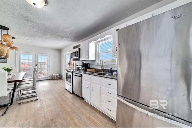 1360 WEST BEACH Boulevard, Gulf Shores, AL 36542