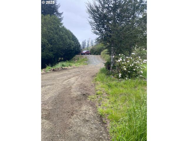 67482 E BAY Rd, North Bend, OR 97459