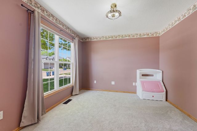 613 Conor Court, Blue Grass, IA 52726
