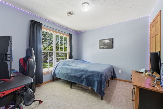613 Conor Court, Blue Grass, IA 52726