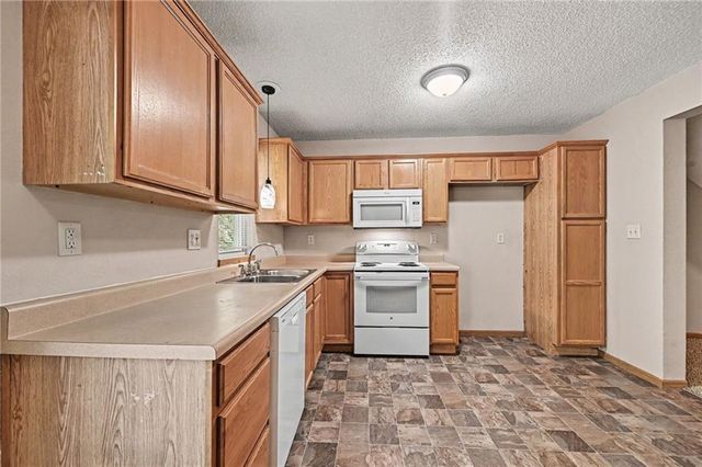 210 Pointe Lane, Raymore, MO 64083