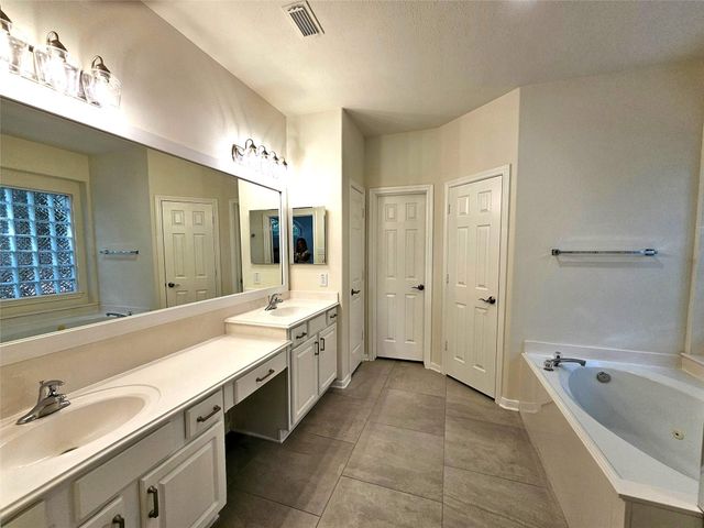 98 W Knightsbridge Drive, The Woodlands, TX 77385