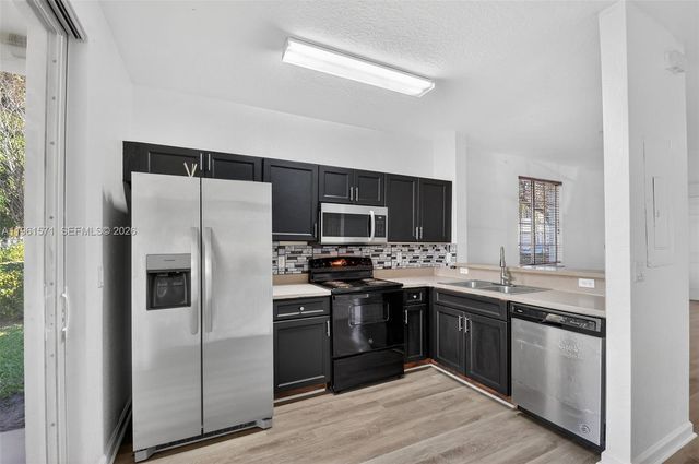 4206 Napoli Lake Dr, Riviera Beach, FL 33410