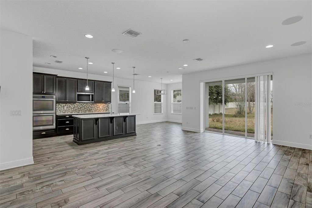 Image 23 of property listing at 1138 FOUNTAIN COIN LOOP, Orlando, FL 32828