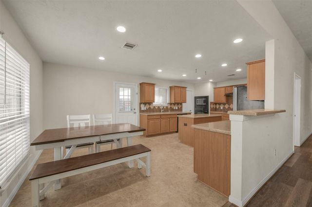 6815 Amistad Court, Manvel, TX 77578