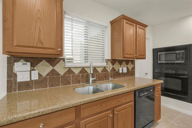 6815 Amistad Court, Manvel, TX 77578