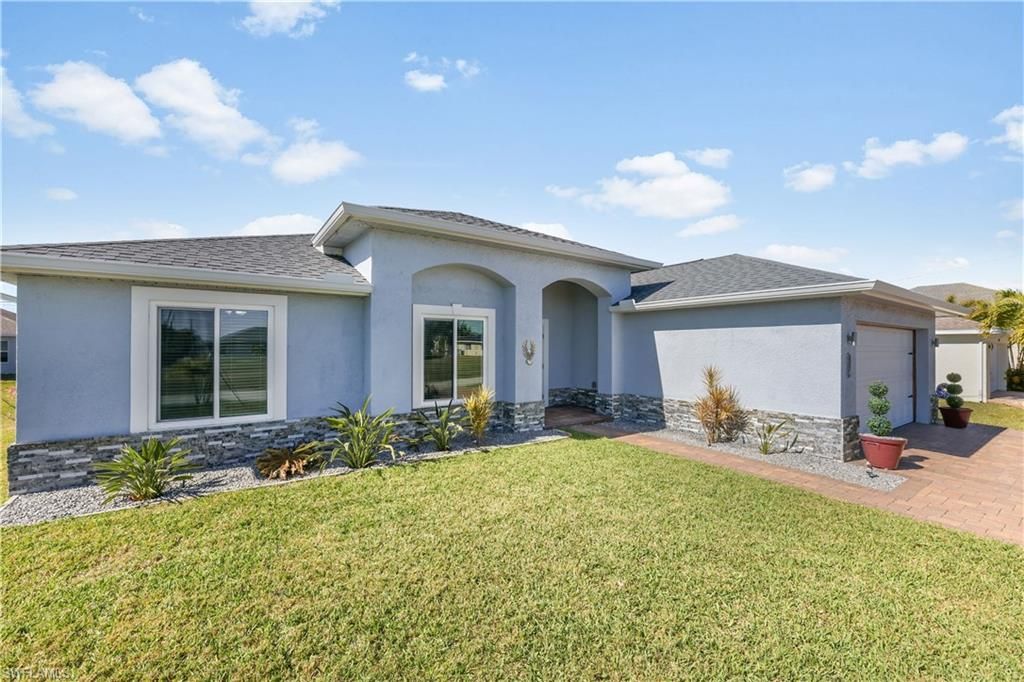 Image 2 of property listing at 214 NW 25th AVE, Cape Coral, FL 33993