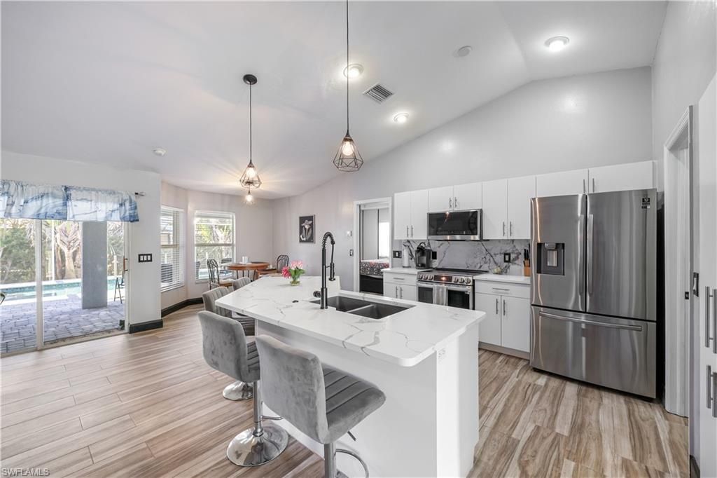 Image 6 of property listing at 214 NW 25th AVE, Cape Coral, FL 33993