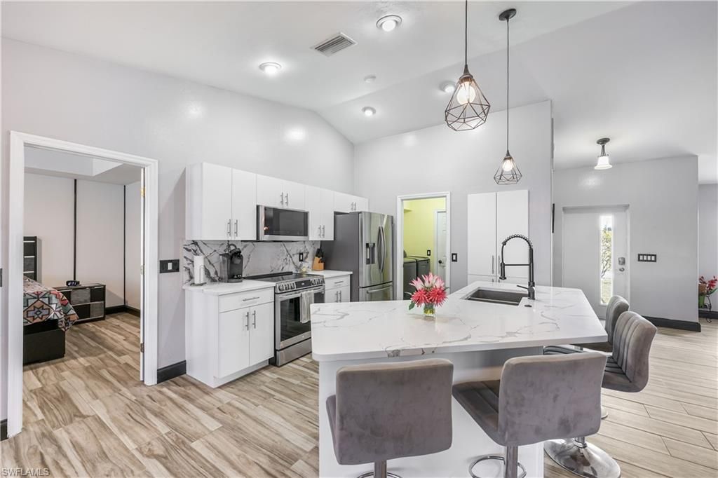 Image 7 of property listing at 214 NW 25th AVE, Cape Coral, FL 33993