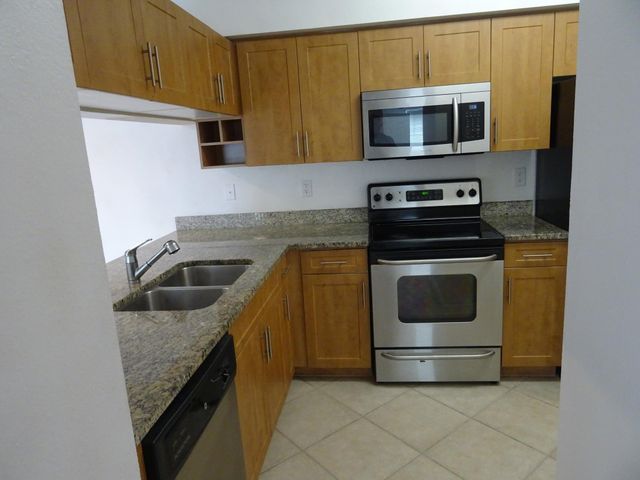 6450 Emerald Dunes Drive 103, West Palm Beach, FL 33411
