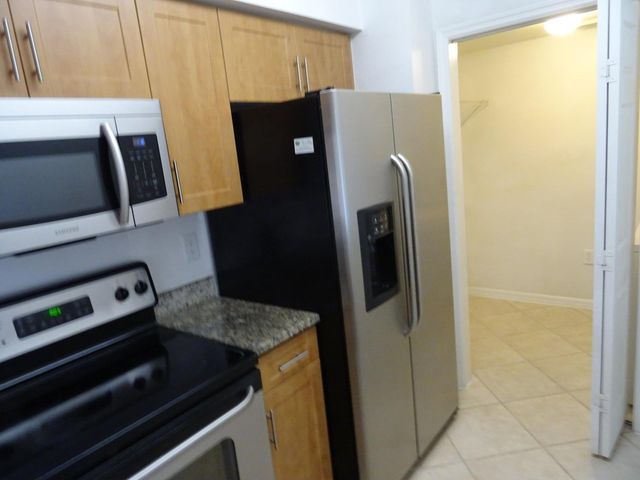 6450 Emerald Dunes Drive 103, West Palm Beach, FL 33411