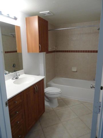 6450 Emerald Dunes Drive 103, West Palm Beach, FL 33411