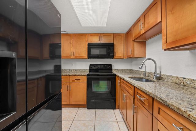 484 BANYON TREE CIRCLE 100, Maitland, FL 32751
