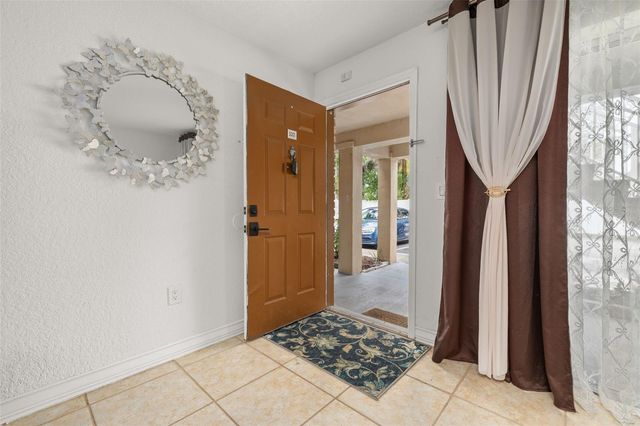 484 BANYON TREE CIRCLE 100, Maitland, FL 32751