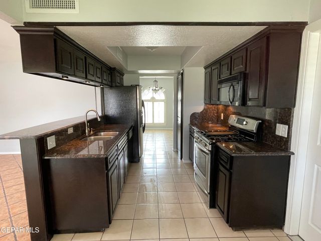 11417 REX BAXTER Drive, El Paso, TX 79936