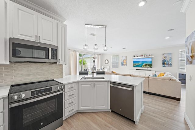 166 Honeysuckle Drive, Jupiter, FL 33458