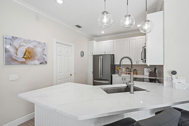 166 Honeysuckle Drive, Jupiter, FL 33458