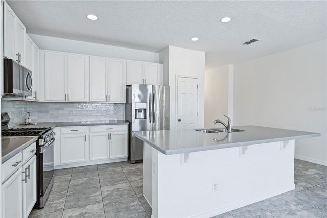 2212 NAPONE LANE, Minneola, FL 34715