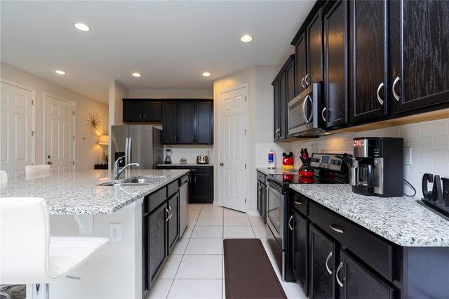 9039 PELICAN COVE TRACE, Kissimmee, FL 34747