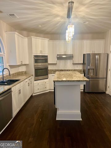 392 Brookwater Court, Stone Mountain, GA 30087