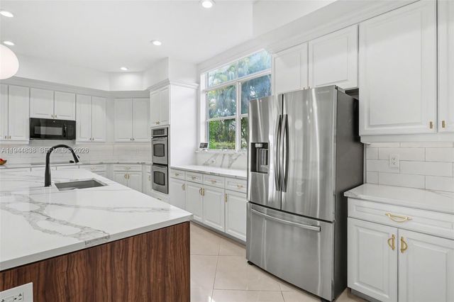 11606 Hibbs Grove Dr, Cooper City, FL 33330