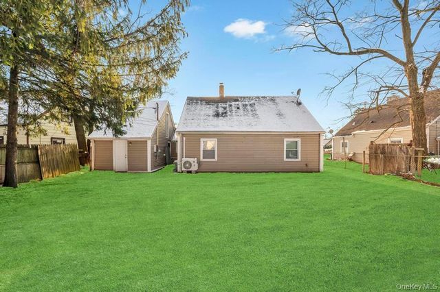 66 Maplewood Drive, Westbury, NY 11590