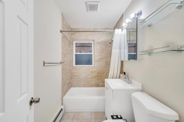 66 Maplewood Drive, Westbury, NY 11590