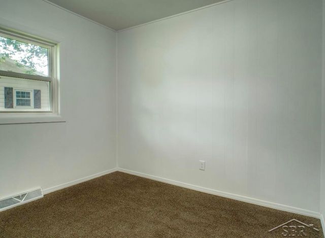 1253 W Nebobish Road, Essexville, MI 48732