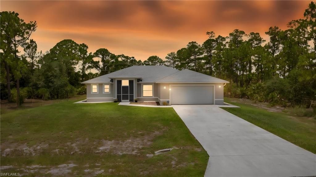 611 Truman AVE, LEHIGH ACRES, FL 33972 — exterior