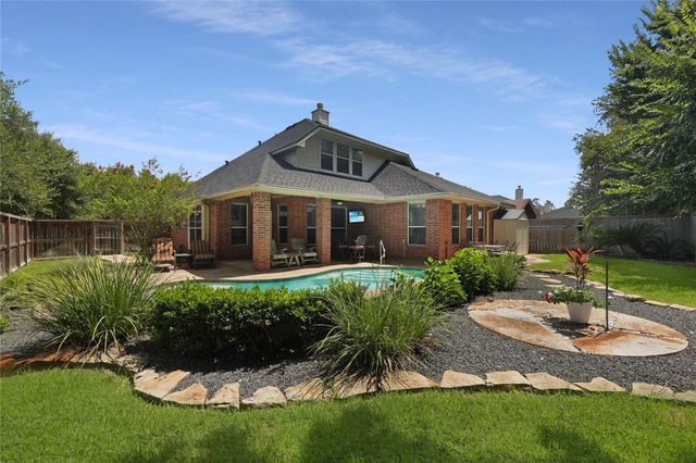 6515 Greencreek Meadows Lane, Spring, TX 77379