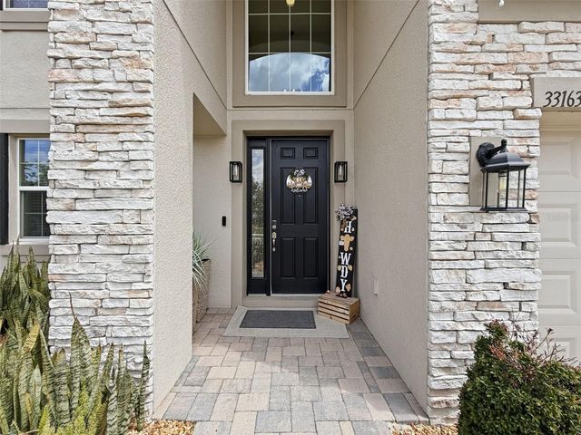 33163 SYCAMORE LEAF DRIVE, Wesley Chapel, FL 33545