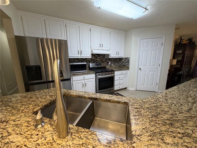 4080 Landress Park NW Drive, Lilburn, GA 30047