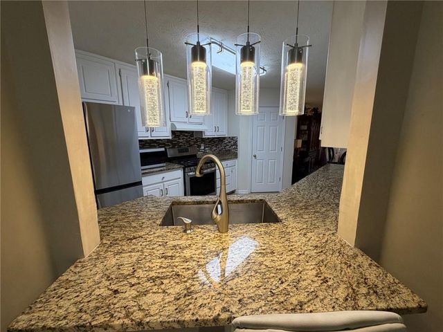 4080 Landress Park NW Drive, Lilburn, GA 30047