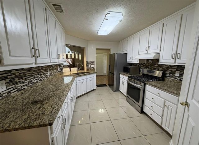 4080 Landress Park NW Drive, Lilburn, GA 30047