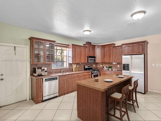279 NW 119th Ave., Miami, FL 33182