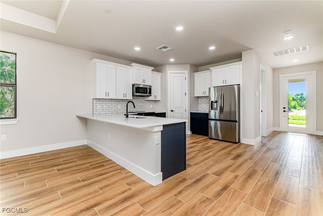 4157 NW 39th AVE, Cape Coral, FL 33993