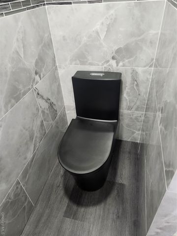 3 Brook Lane, Levittown, NY 11756