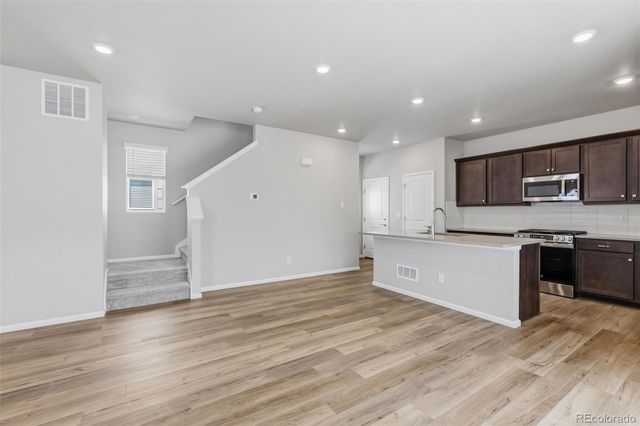 21051 E 63rd Drive, Aurora, CO 80019