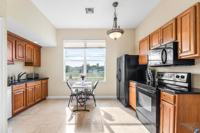 17371 W Sycamore Drive, The Acreage, FL 33470