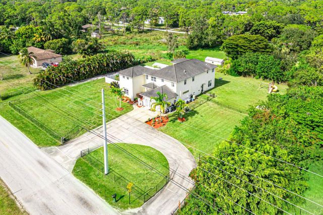17371 W Sycamore Drive, The Acreage, FL 33470