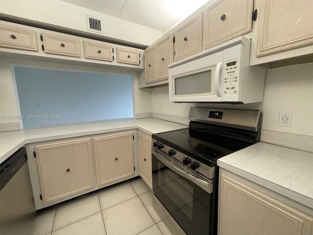 9441 Live Oak Place 209, Davie, FL 33324