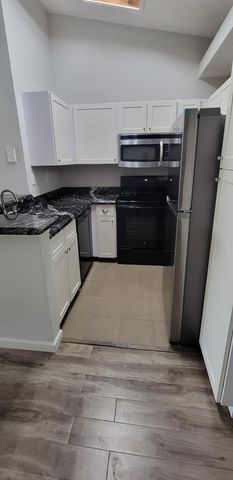 611 Lyons Road 8202, Coconut Creek, FL 33063