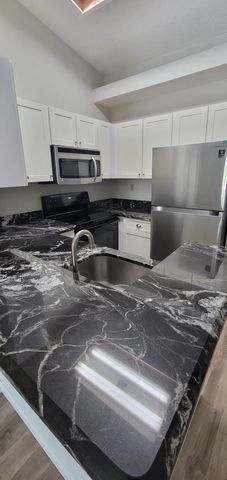 611 Lyons Road 8202, Coconut Creek, FL 33063