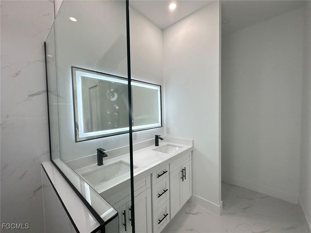 1214 Cherry ST E, Lehigh Acres, FL 33974