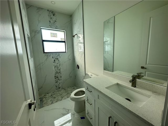 1214 Cherry ST E, Lehigh Acres, FL 33974