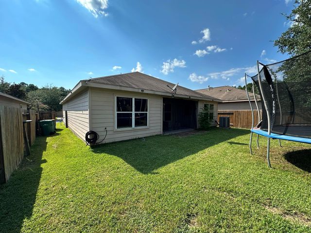 303 Pine Mist Lane, Conroe, TX 77304