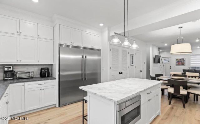 7 Center Street July/August, Sea Bright, NJ 07760